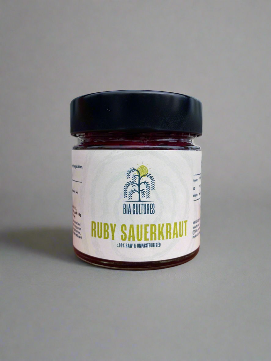 Jar of Ruby Sauerkraut with vibrant red cabbage and onions, handmade Irish fermented vegetables